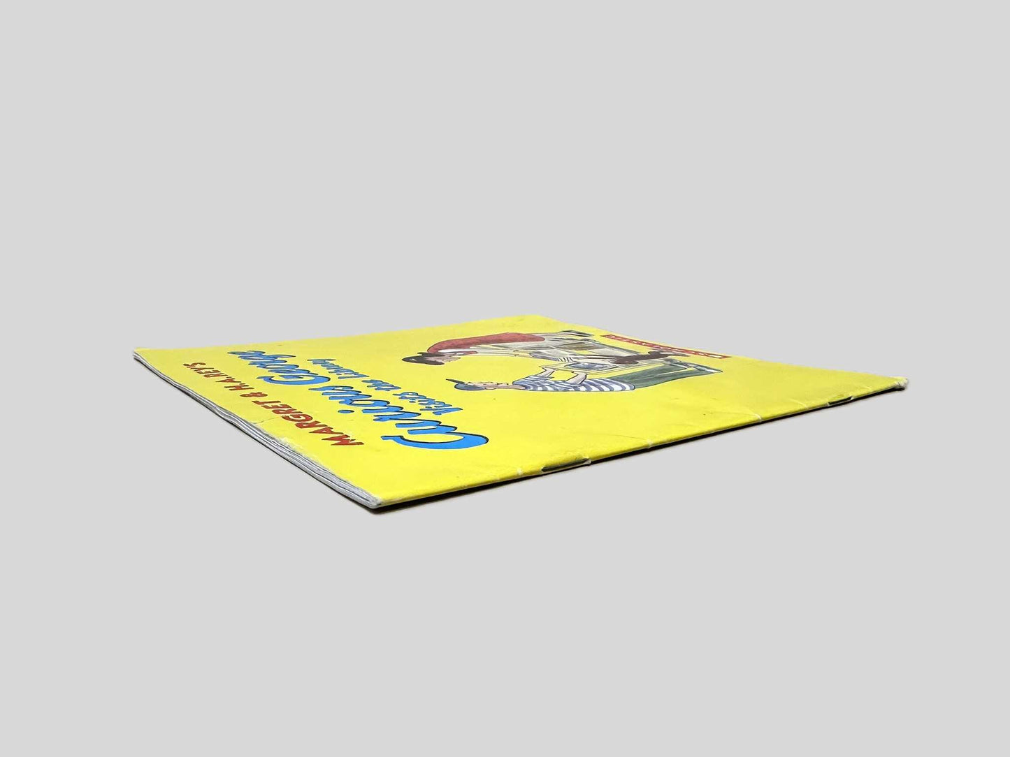 Curious George Visits the Library by Margret & H.A. Rey - Fehmerling Books