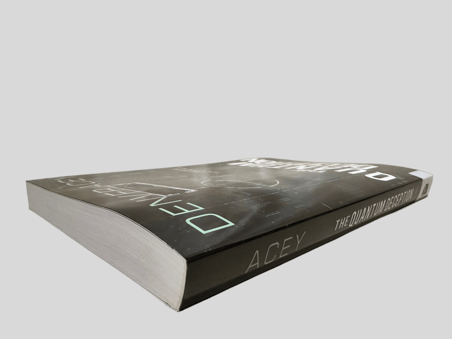 The Quantum Deception by Denver Acey - Book Spine