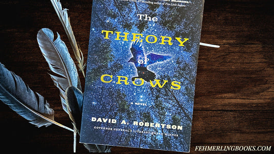 Moody "Mystic Highlands" aesthetic: The Theory of Crows rests on dark wood alongside wild bird feathers. This gothic Dark Academia composition evokes folklore and mystery.