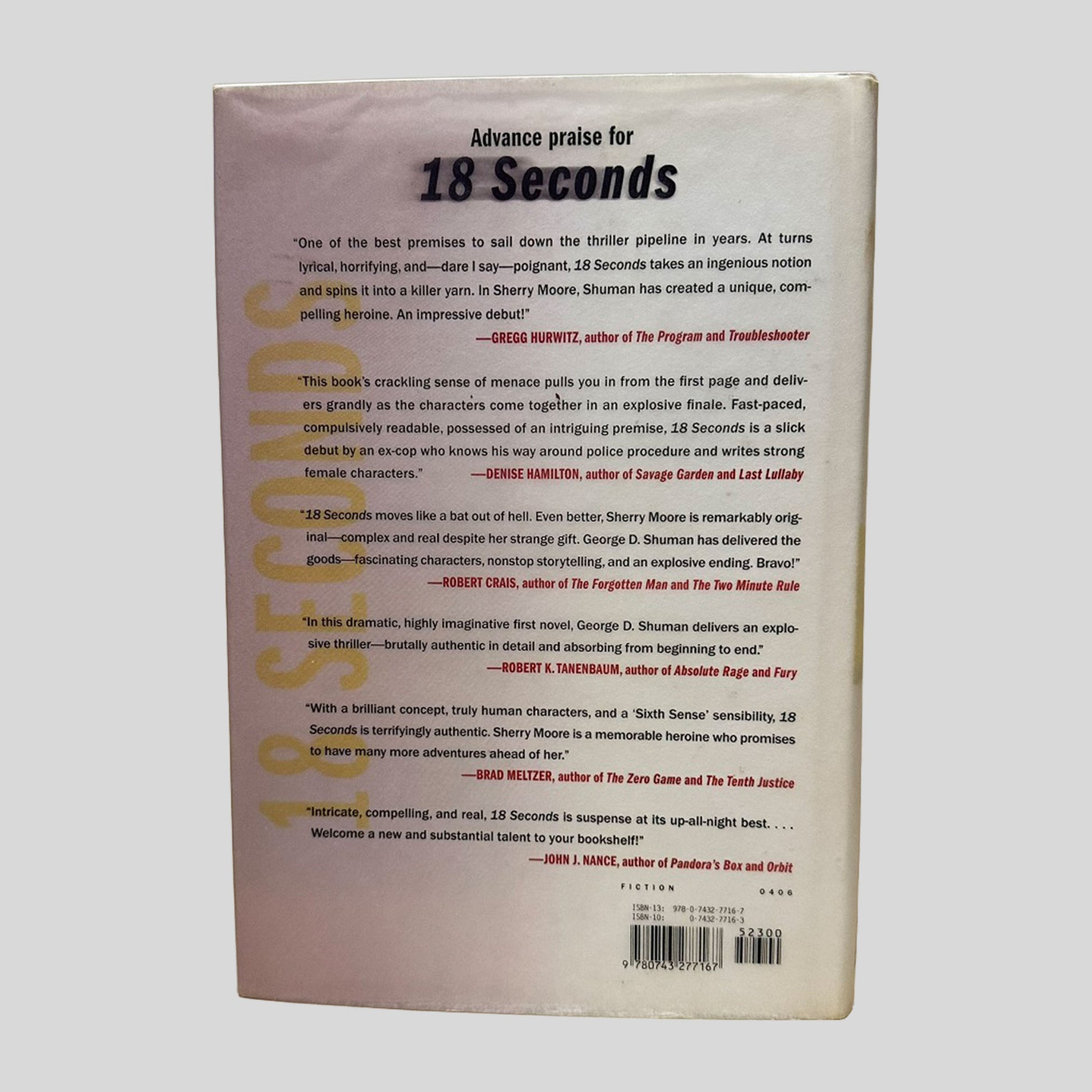 Back cover of the 18 Seconds hardcover by George Shuman. The layout features multiple critical reviews and praise for the thriller and a clear barcode with ISBN 9780743277167.