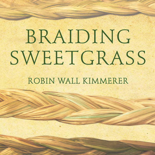 Book cover of 'Braiding Sweetgrass' with braided sweetgrass design on a beige background