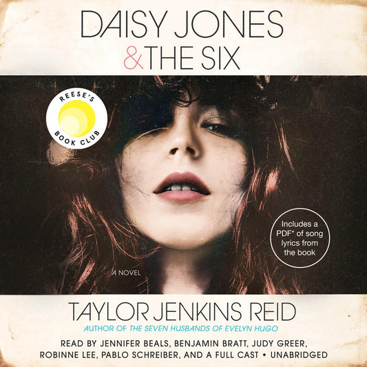 Book cover of 'Daisy Jones & The Six' by Taylor Jenkins Reid, featuring a close-up of a woman's face.