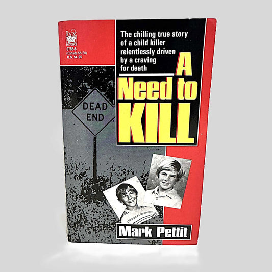 Front cover view of A Need to Kill by Mark Pettit centered on a neutral light gray background. 