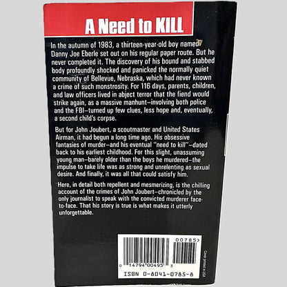 Back cover view of A Need to Kill by Mark Pettit centered on a neutral light gray background. 
