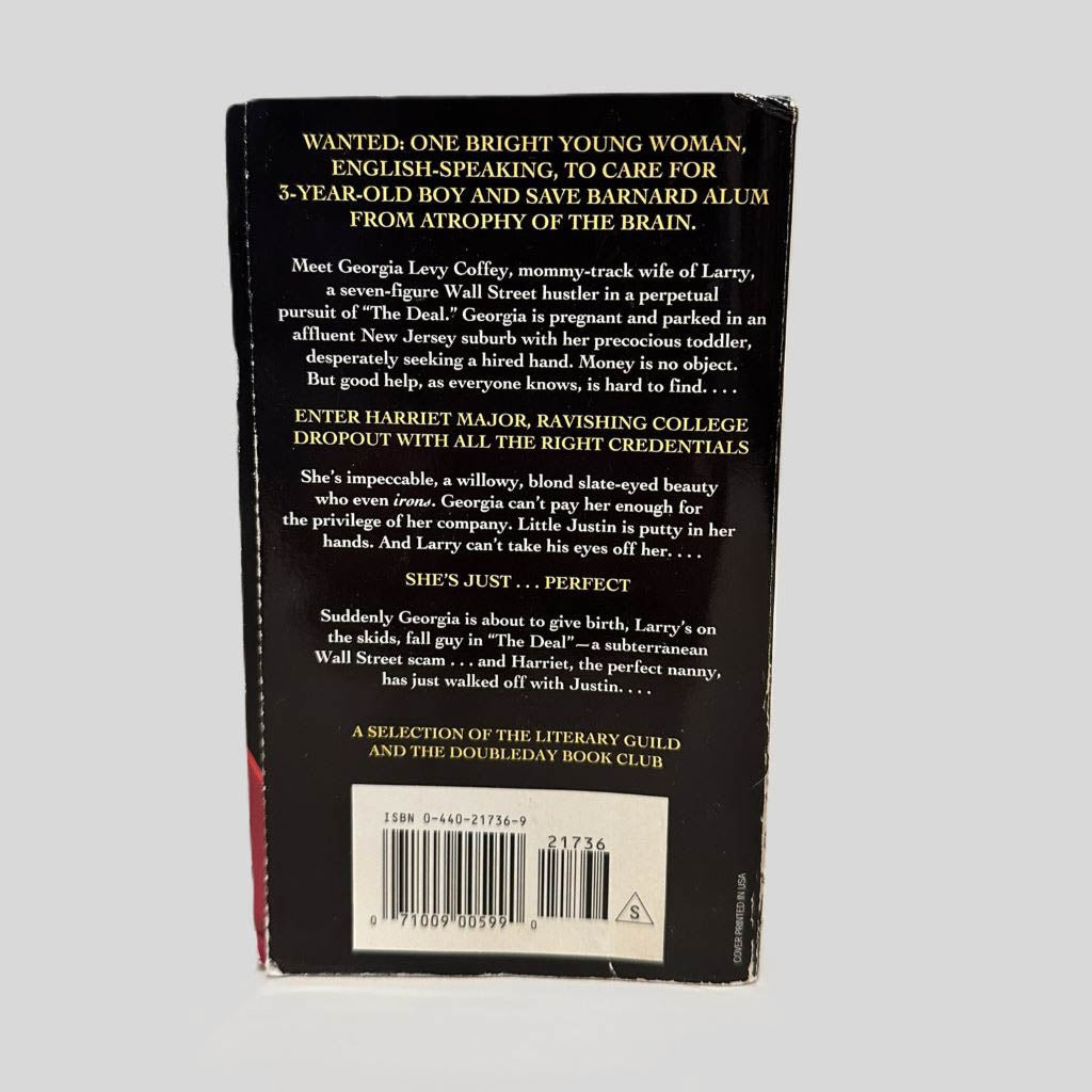 Back cover view of A Perfect Wife and Mother by Alexandra Frye centered on a neutral light gray background. Chipping is present on corners.