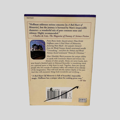 Back cover view of A Red Heart of Memories by Nina Kiriki Hoffman centered on a neutral light gray background. 