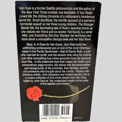 Back cover view of A Rose For Her Grave by Ann Rule centered on a neutral light gray background. 