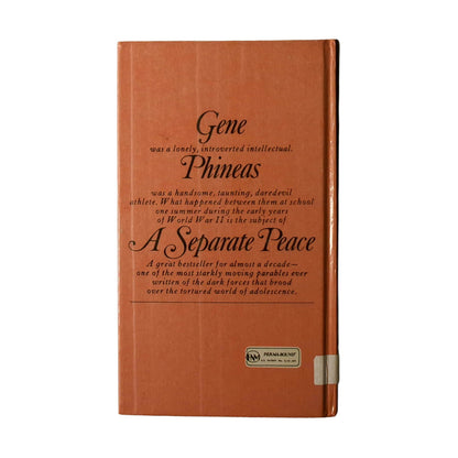 Back cover view of A Separate Peace by John Knowles centered on a neutral light gray background. Bumping is present on the lower spine edge. White tape across the bottom of the spine for library cataloging.