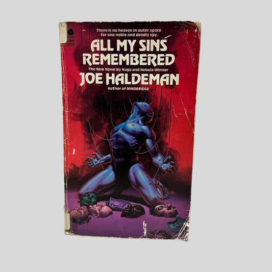 Front cover view of All My Sins Remembered by Joe Haldeman centered on a neutral light gray background. Chipping and creasing on the corners. Creasing and rubbing present. Colors are vibrant.