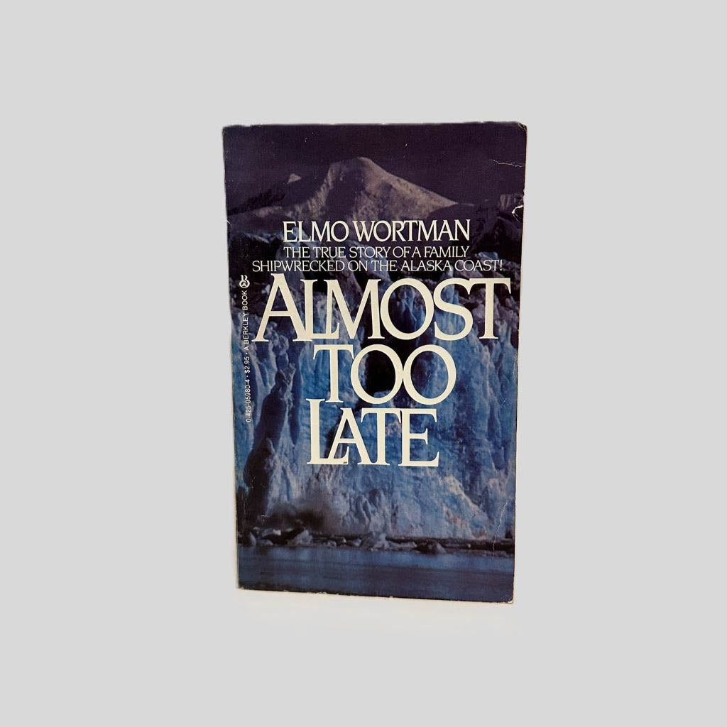 Front cover view of Almost Too Late by Elmo Wortman centered on a neutral light gray background. Normal chipping and creasing from age are present around the edges.