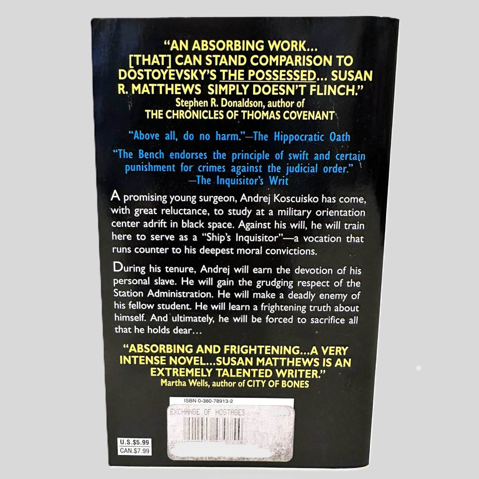 Back cover view of An Exchange of Hostages by Susan R. Matthews centered on a neutral light gray background. 