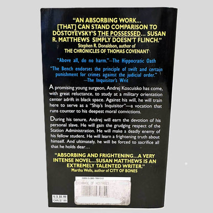 Back cover view of An Exchange of Hostages by Susan R. Matthews centered on a neutral light gray background. 