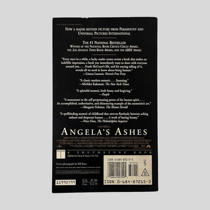 The back cover of the memoir "Angela's Ashes" by Frank McCourt, displaying several literary awards, critical praise, and the Touchstone Books logo.