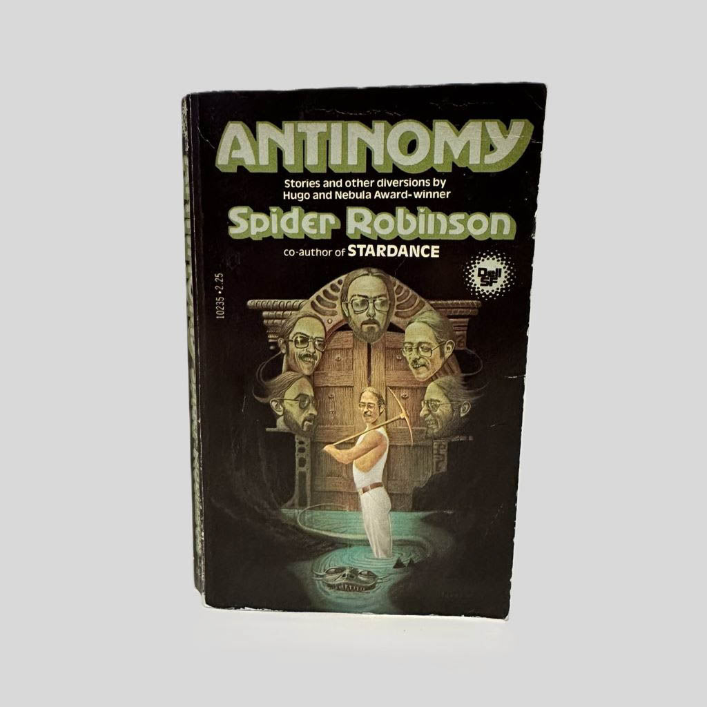 Front cover view of Antinomy by Spider Robinson centered on a neutral light gray background. Chipping and creasing around the edges from normal wear and age.