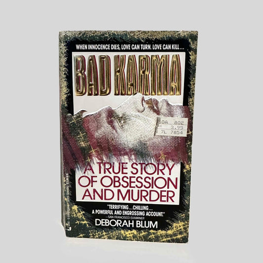 Front cover view of Bad Karma by Deborah Blum centered on a neutral light gray background. 