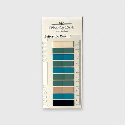 Fehmerling Books "Before the Rain" book journaling tabs featuring deep teal, forest green, and light beige notes on a notched ruler card.