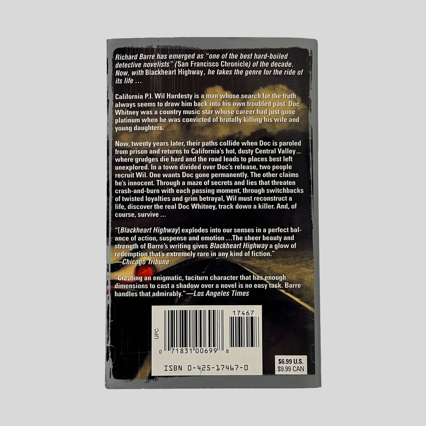 The back cover of Blackheart Highway, displaying critical praise from the Chicago Tribune and Los Angeles Times above a plot summary of the Doc Whitney case.
