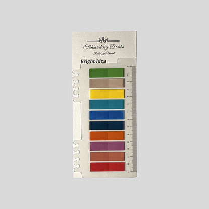 Fehmerling Books "Bright Idea" book journaling tabs featuring crimson red, mustard yellow, and royal blue notes on a notched ruler card.
