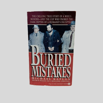 Front cover view of Buried Mistakes by Michael Kaplan centered on a neutral light gray background. 