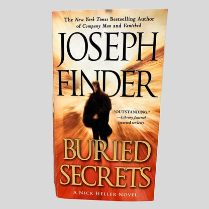 Front cover view of Buried Secrets by Joseph Finder centered on a neutral light gray background. 