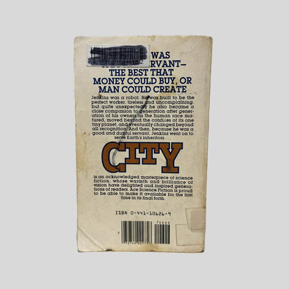 Back cover view of City by Clifford D. Simak centered on a neutral light gray background. Creasing, rubbing and scuff marks are present on the back cover. Library barcode sticker in the top left corner, colored over with black ink. 