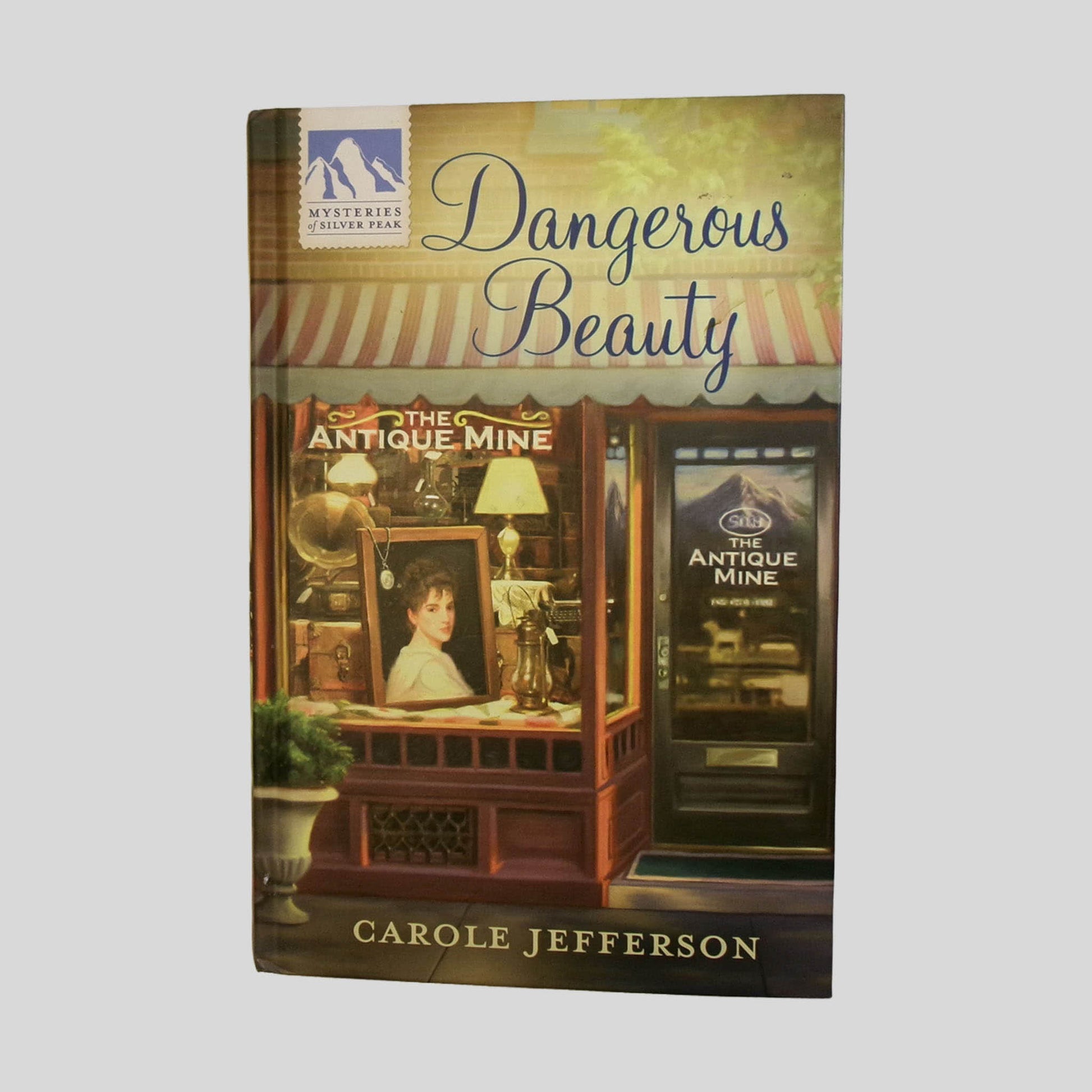 Front cover view of Dangerous Beauty by Carol Jefferson centered on a neutral light gray background. 