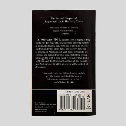 The black back cover of Dark City, displaying a plot summary about Jack's 1991 New York odyssey and a quote from Publishers Weekly.