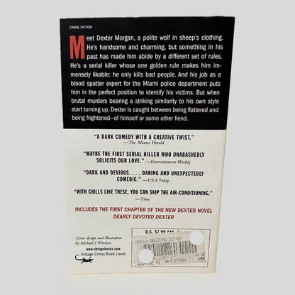 Back cover view of Darkly Dreaming Dexter by Jeff Lindsay centered on a neutral light gray background. 