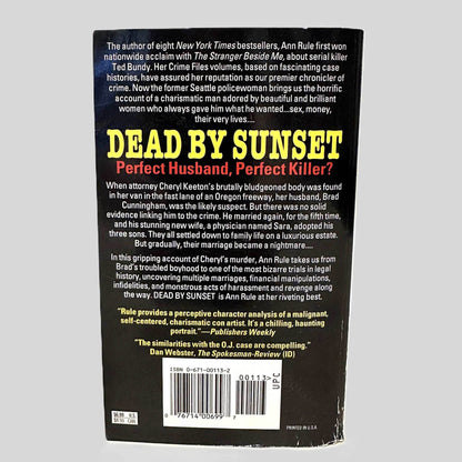 Back cover view of Dead by Sunset by Ann Rule centered on a neutral light gray background. 