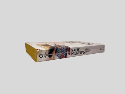 Close-up spine view of Deadly Intentions by William Randolph Stevens centered on a neutral light gray background. Spine shows creasing and bumping.