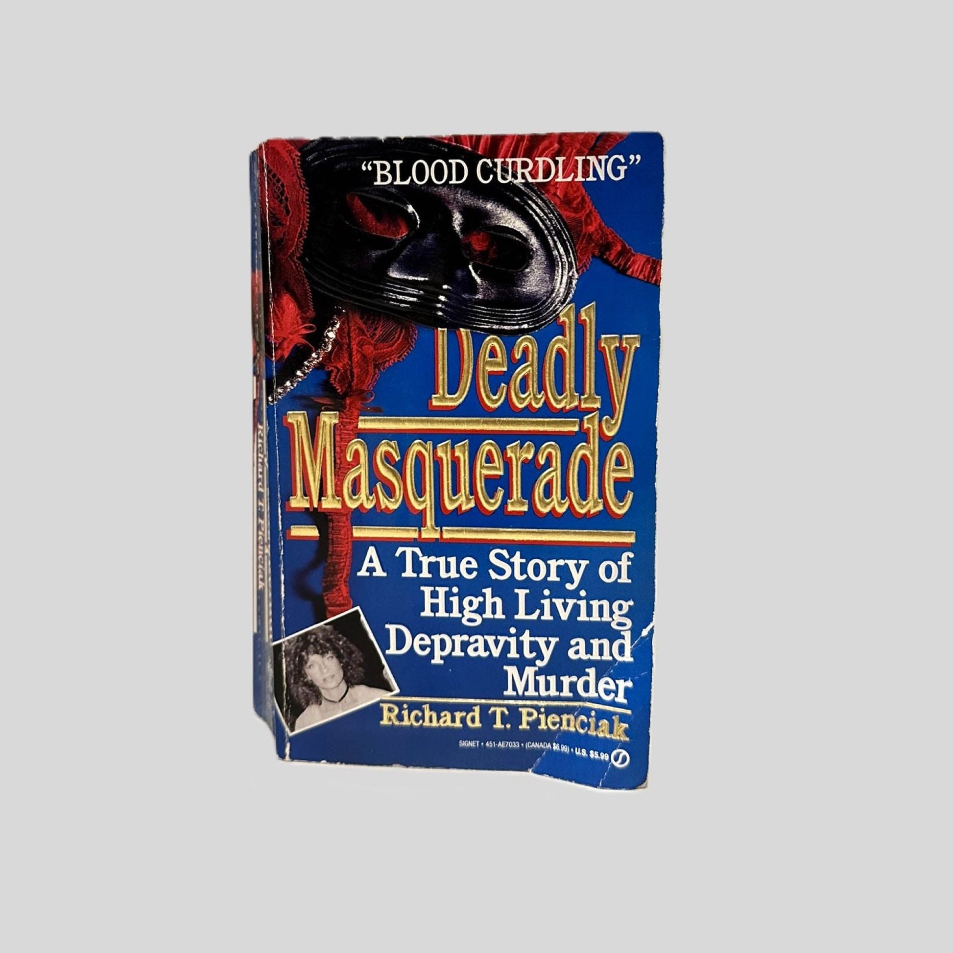 Front cover view of Deadly Masquerade by Richard T. Pienciak centered on a neutral light gray background. 