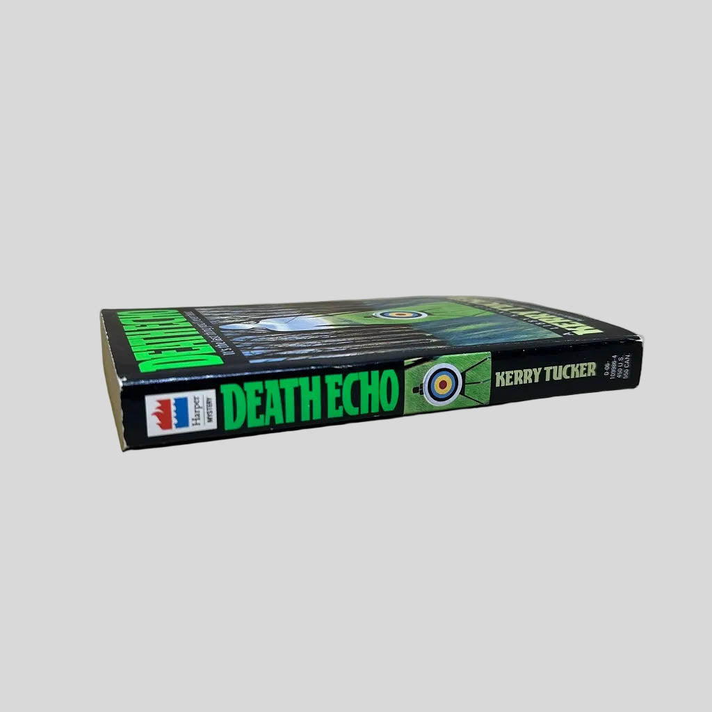 Close-up spine view of Death Echo by Kerry Tucker centered on a neutral light gray background. Spine is square, shows minimal creasing.