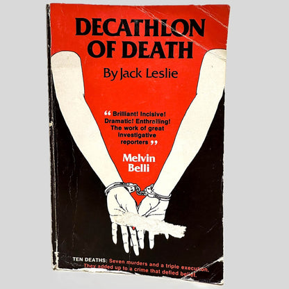 Front cover view of Decathlon of Death by Jack Leslie centered on a neutral light gray background. Cover shows creasing and rubbing.