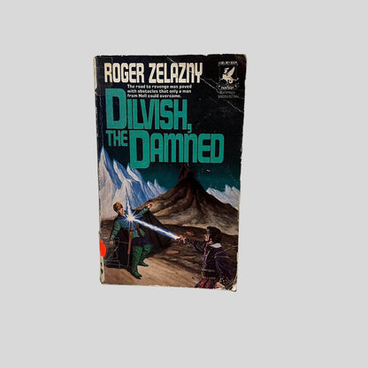 Front cover view of Dilvish, the Damned by Roger Zelazny centered on a neutral light gray background. Creasing is present across the right side corners. Chipping from age and wear around the edges. Cover art is vibrant.