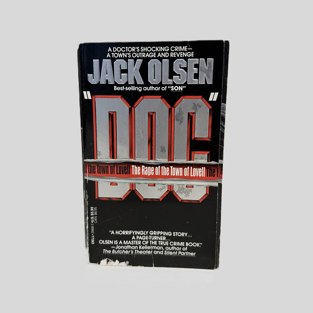 Front cover view of Doc by Jack Olsen centered on a neutral light gray background. 