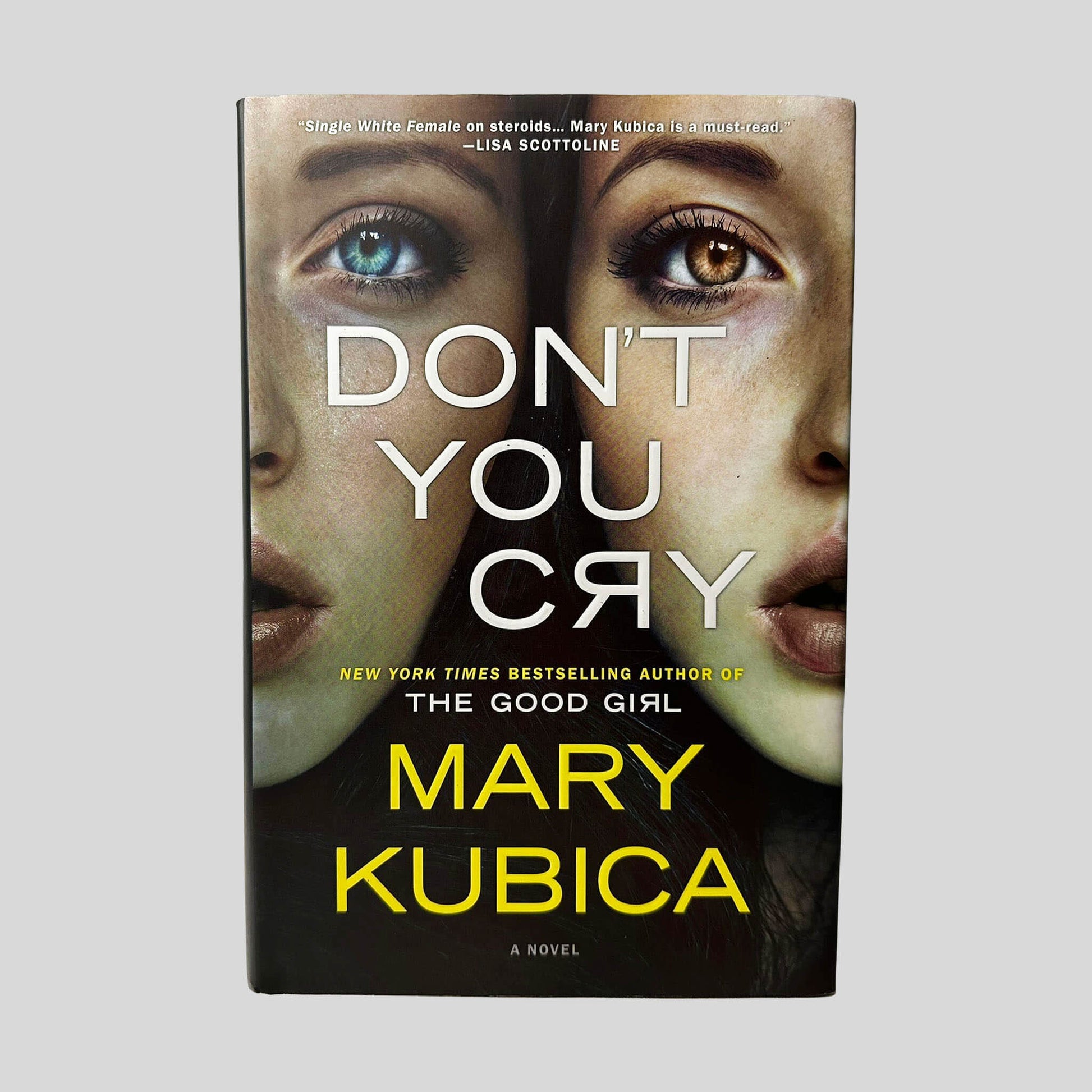 Front cover view of Don't You Cry by Mary Kubica centered on a neutral light gray background. Dust jacket present and pristine.