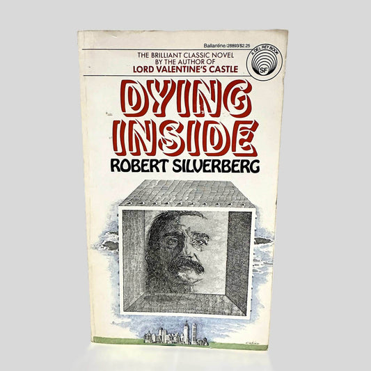 Front cover view of Dying Inside by Robert Silverberg centered on a neutral light gray background. Normal chipping present around the edges from age.