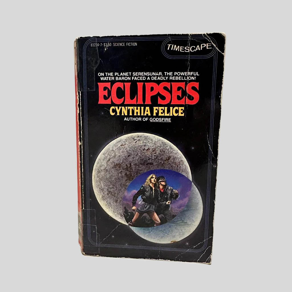 Front cover view of Eclipses by Cynthia Felice centered on a neutral light gray background. Chipping and creasing are present around the edges and corners. The cover art is vibrant. 