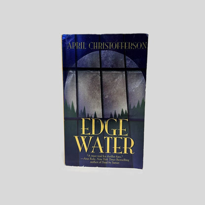 Front cover view of Edge Water by April Christofferson centered on a neutral light gray background. Bumping in the top left corner.