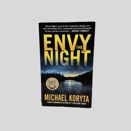 Front cover view of Envy the Night by Michael Koryta centered on a neutral light gray background. 