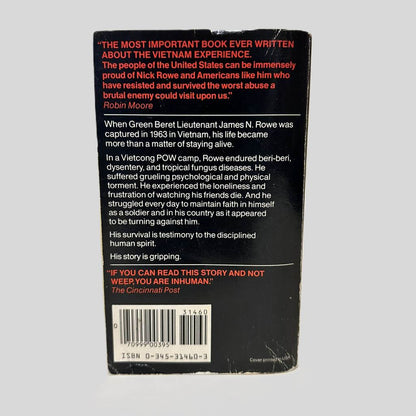 Back cover view of Five Years to Freedom: The True Story of a Vietnam POW by James N. Rowe centered on a neutral light gray background. Chipping and creasing are present.