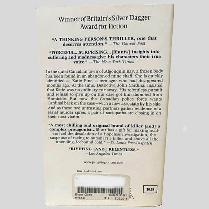 Back cover view of Forty Words for Sorrow by Giles Blunt centered on a neutral light gray background. 