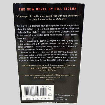 Back cover view of Frames Per Second by Bill Eidson centered on a neutral light gray background. Some chipping present along the edges of the back cover.