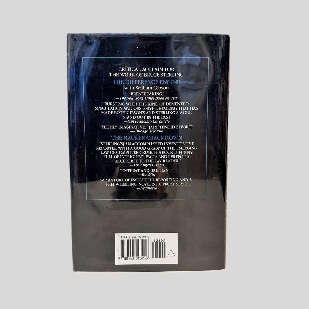 Back cover view of Heavy Weather by Bruce Sterling centered on a neutral light gray background. Dust jacket is present and undamaged.