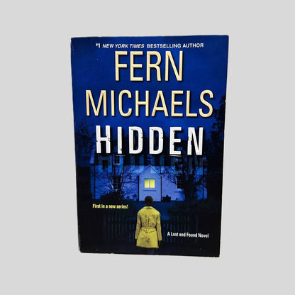 Front cover view of Hidden by Fern Michaels centered on a neutral light gray background. 