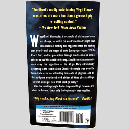 Back cover view of Holy Ghost by John Sandford centered on a neutral light gray background. 