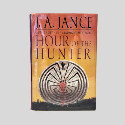 Front cover view of Hour of the Hunter by J.A. Jance centered on a neutral light gray background. Library edition - dust jacket is present and pristine. 