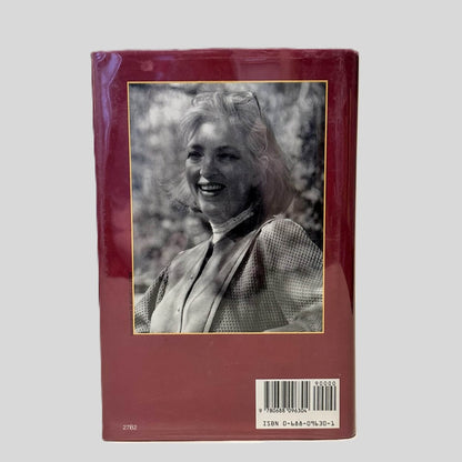 Back cover view of Hour of the Hunter by J.A. Jance centered on a neutral light gray background. Library edition - dust jacket is present and pristine. 