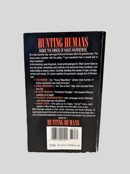 Back cover view of Hunting Humans by Elliott Leyton centered on a neutral light gray background. 