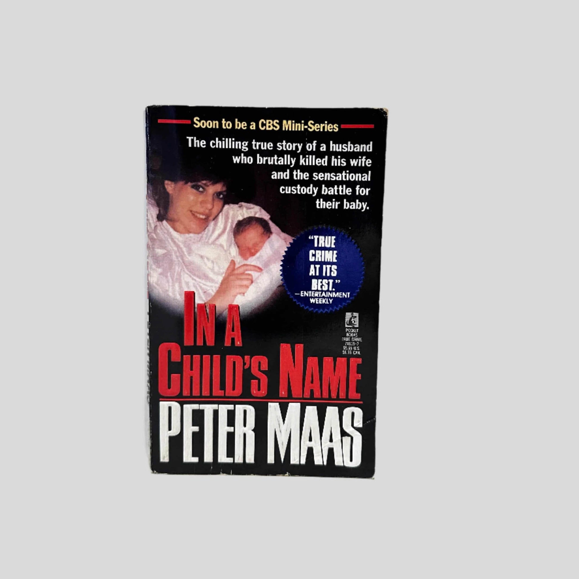 Front cover view of In A Child's Name by Peter Maas centered on a neutral light gray background.